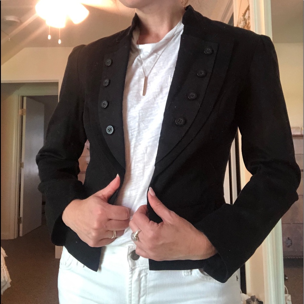 Black blazer with ruched shoulders.
